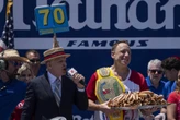 Joey Chestnut reclaims title in Nathan's Famous hot dog eating contest, wins 17th Mustard Belt