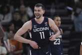 Karaban has 21 points and 11 rebounds in return, leads No. 25 UConn past Texas 76-65