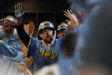 Hoskins' grand slam in 1st inning sparks Brewers to 8-4 victory over Mets