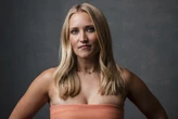 Actor Emily Osment is single as her divorce from musician Jack Farina becomes official