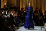 Armani's last collection shown in solemn runway show with Richard Gere, Lauren Hutton in 1st row