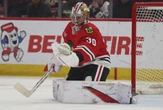 Panthers fans cheer for former goalie Spencer Knight in season opener