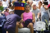 Carlos Alcaraz's brief knee problem at the US Open doesn't slow him down in a win