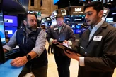 Wall Street and other markets hold steady ahead of a highly anticipated US-China meeting on trade