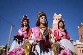 AP PHOTOS: The desert blooms, roses perfume the air and a Moroccan town comes to life