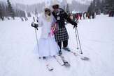 Dozens of couples get hitched at snowy Colorado ski resort on Valentine's Day