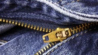 Vous avez sans doute ces trois lettres sur vos vêtements sans le savoir : voici ce que signifie réellement l'inscription YKK