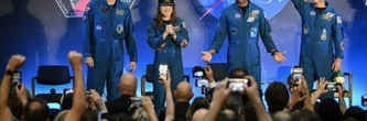 De retour de la Lune, l'équipage d'Artémis II appelle à l'unité sur Terre