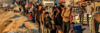 A pied ou entassés dans des camionnettes, des milliers de Palestiniens fuient Gaza-ville