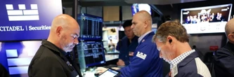 Triple record à Wall Street, poussée par les perspectives de baisses des taux