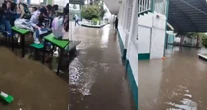 VIDEO ¬ Primaria de Acolman, Edomex, se inunda; niños usan pupitres para no mojarse