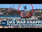 PANIK AM STRAND: F18-Jet fliegt kopfüber über Strand – Gijón entgeht nur knapp dem Unglück!
