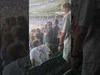 WATCH: Cubs fan SLAPS spectator during national anthem