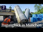 Waggons liegen auf Straße, eine Person schwer verletzt