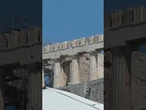 A man stabbed and injured two American tourists near Greece’s top tourist attraction