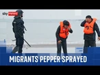 French police use pepper spray on migrants