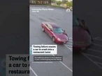 Towing failure sends car crashing into restaurant twice