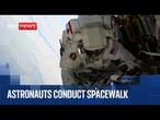 NASA astronauts on spacewalk at International Space Station