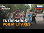 RUSIA: 83 NIÑOS reciben PREPARACIÓN MILITAR en un CAMPAMENTO de VERANO | RTVE Noticias