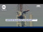 Daredevils reach top of Empire State Building with banner, before apparent proposal