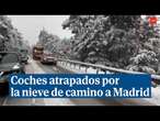 Cientos de coches atascados por la nieve en su camino hacia Madrid