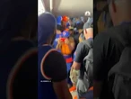 Knicks fans take over NYC streets and scaffolding for parade