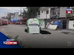Camion inghiottito da una gigantesca voragine in strada