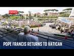 Pope arrives back at Vatican after making first public appearance in five weeks