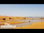 Drone footage shows rare flooding in the Sahara desert