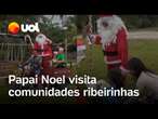 Papai Noel entrega presentes de Natal para crianças em comunidades ribeirinhas no Amazonas