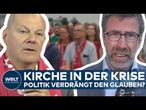 KIRCHENTAG IN HANNOVER: Kirche wird politisch! Scholz diskutiert über Glauben, Waffen und Klimakrise