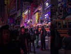 Fans scale buses in Times Square after Knicks win NBA title