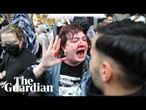 Footage shows police officer punching activist Kitty O'Brien in the face during a protest
