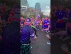 Police officer juggles soccer ball with World Cup fans