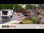 Body found in floodwaters and troops injured in Australia storm | BBC News