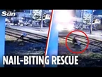 Heart-stopping moment hero runs in front of train to rescue man collapsed on track