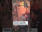 Elderly man in a wheelchair rescued from raging wildfire approaching his home in Turkey