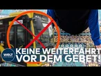 DEUTSCHLAND: Busfahrer stoppt volle Linie — dann rollt er den Gebetsteppich aus!