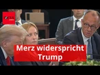 Merz liefert sich auf der größten Bühne Schlagabtausch mit Trump: Die Szene im Video