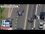MANHUNT UNDERWAY after suspect allegedly hits ICE agent with vehicle