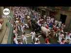 Daredevils run with charging bulls at centuries-old festival in Spain