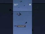 Stealth bomber flies over New York Harbor during Sail4th 250