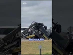 Shocking moment a crane collides with bridge