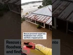 Rescuers rappel into Australian floodwaters and find a trapped person.