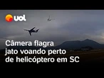 Jato é flagrado voando perto de helicóptero durante decolagem em Santa Catarina; veja vídeo
