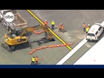 Sinkhole at NYC airport snarls record holiday travel weekend