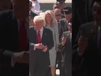 Trump dances with performers, waves flags after landing in Malaysia #trump #airforceone