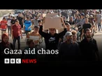 Desperate crowds of Palestinians overrun controversial food distribution site in Gaza | BBC News