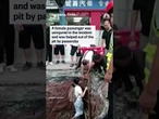 Vdeo shows the moments after a self-driving taxi fell into a construction pit in central China