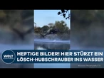 HUBSCHRAUBER-ABSTURZ GEFILMT: Sie wollten Löschwasser holen - Besatzung bleibt zum Glück unverletzt